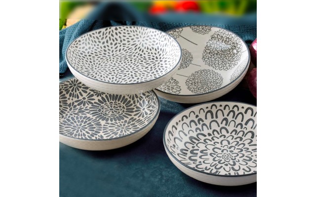  Bowl Set 4 pieces each with a different pattern