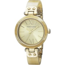 Anne Klein Women’s 109652CHHN Gold-Tone Horn Plastic Bezel and Bangle Bracelet Watch